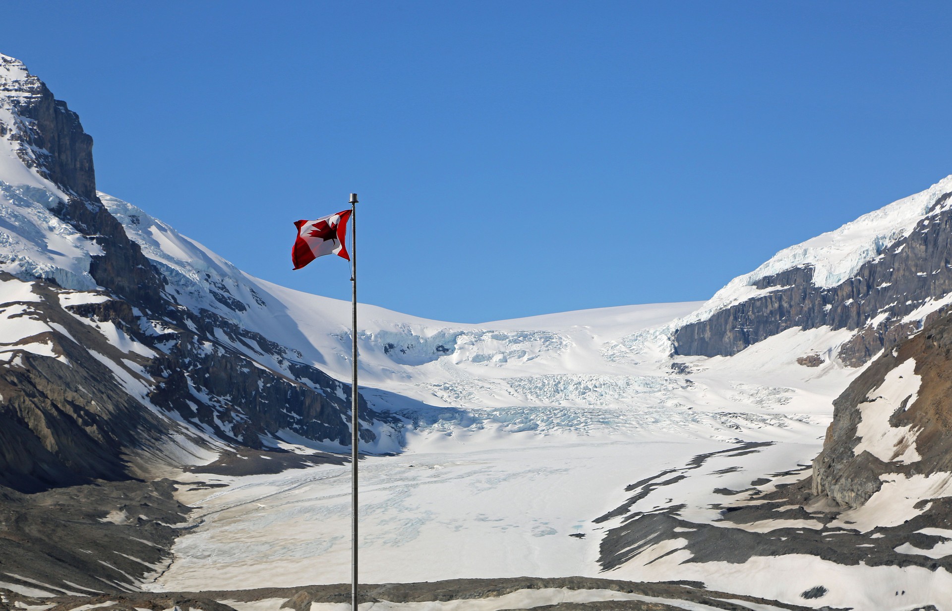 Canada flag and Athabasca glacier